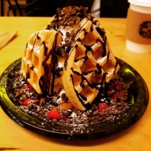 love to go in san gabriel ca a small coffee and dessert shop i ordered the waffles with ice cream strawberries and chocolate syrup 771087