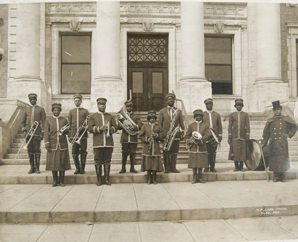 a 1920 photograph of an all Black musical band on the steps of a courthouse in Elko Nevada Autry Collection
