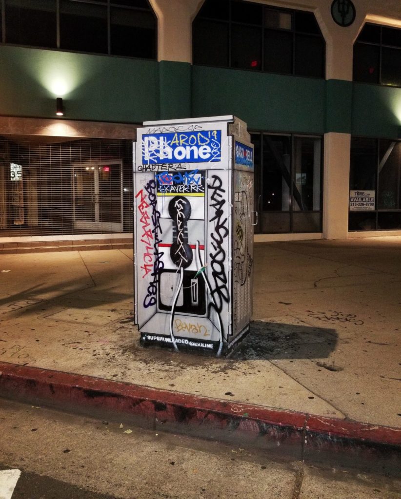 A tagged phone booth electrical box by Gaso in the Arts District photo by Nicholas White