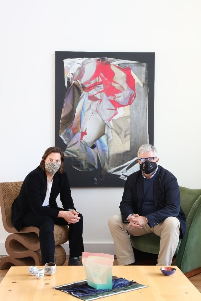 Michael Slenske and Gerard OBrien surrounded by works by Frank Gehry Larry Bell Billy Al Bengston Magdalena Suarez Frimkess Ken Price and Chuck Arnoldi photo by Joshua White