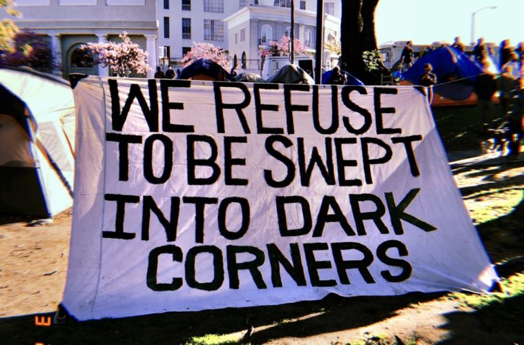 LAPD And Protesters Clash As Echo Park Lake Closure Begins 38 homeless protest echo park 1