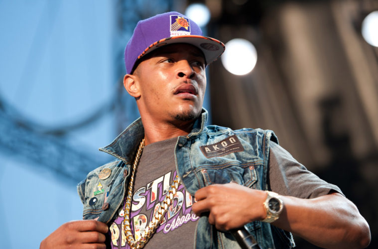 T.I. performing in concert wearing a Phoenix Suns cap
