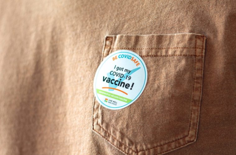marisol benitez vaccinated sticker unsplash