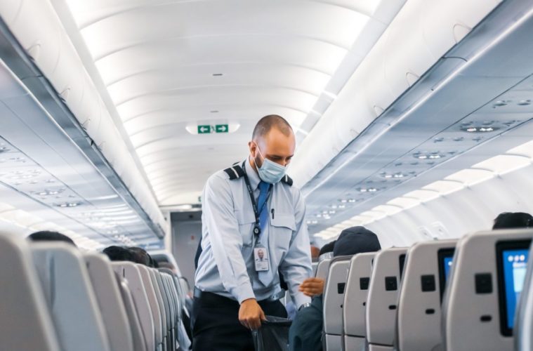5 things to do if you get covid 19 while traveling scaled e1626723025498
