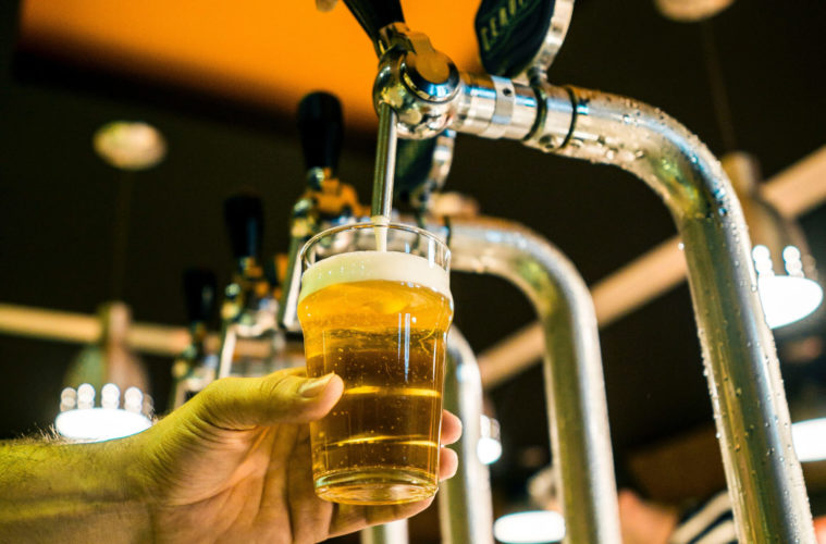 Rose Bowl To Sell Alcohol At UCLA Games For First Time Since 1989 38 fabio alves beer pour unsplash