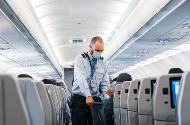 L.A. County Will Keep Mask Mandate For Travel Despite Federal Ruling 38 lukas souza mask airplane unsplash