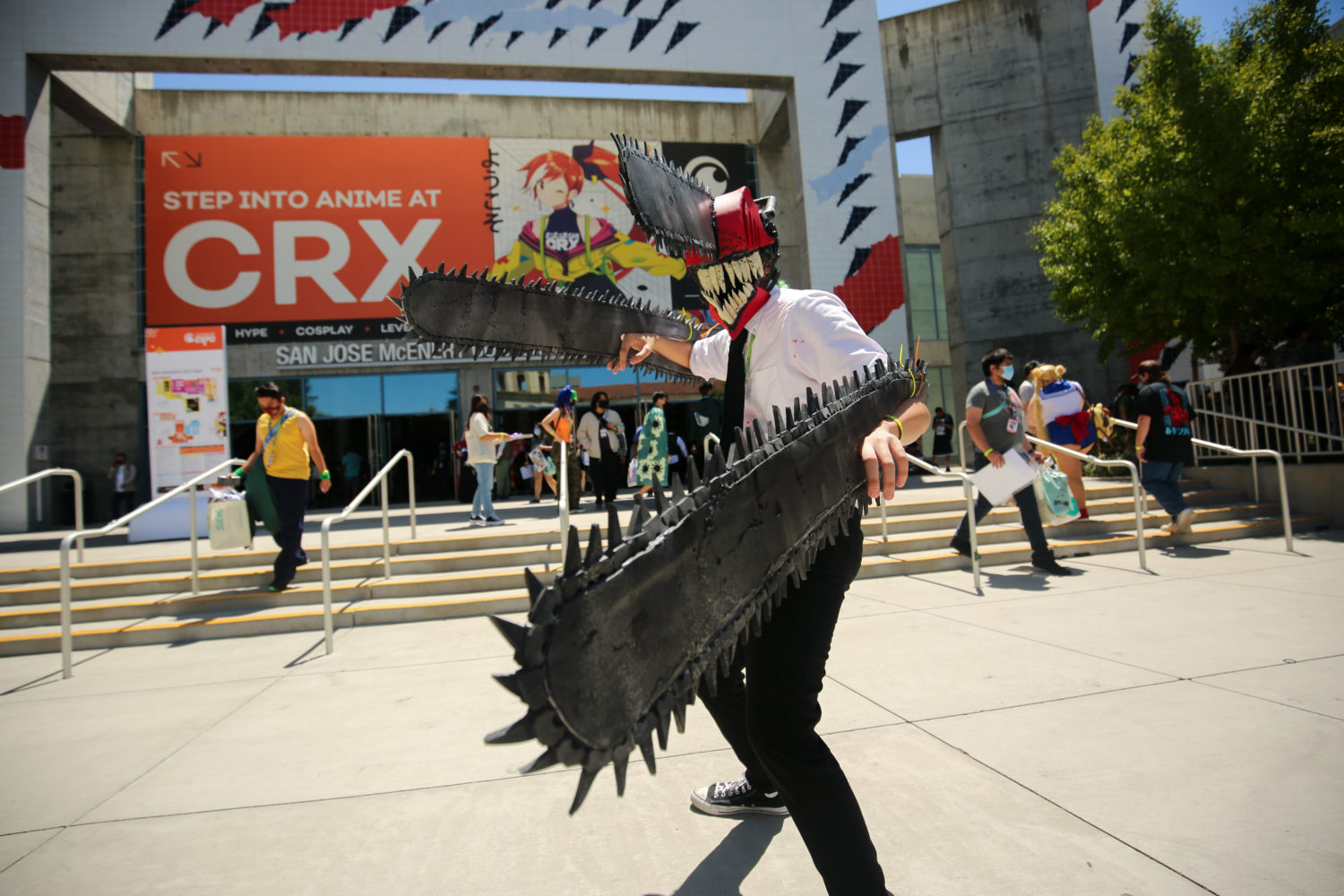 A Chainsaw Man cosplayer outside of Crunchyroll