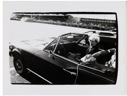 Andy Warhol in Convertible 1985