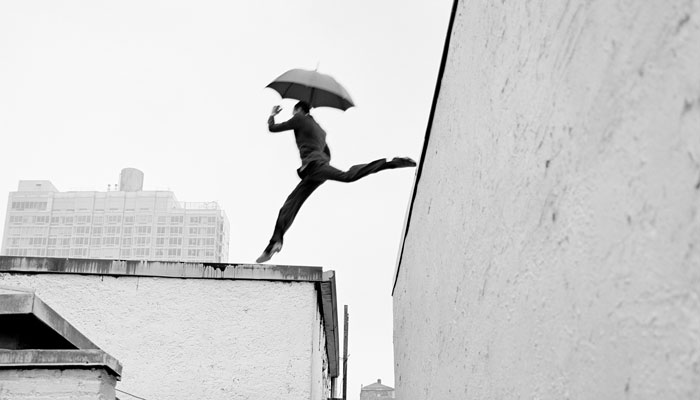 Getty Center Reed Leaping Over Rooftop New York New York detail 2007. Rodney Smith. Gelatin silver print. © 2023 Rodney Smith Ltd. courtesy of the Estate of Rodney Smith.