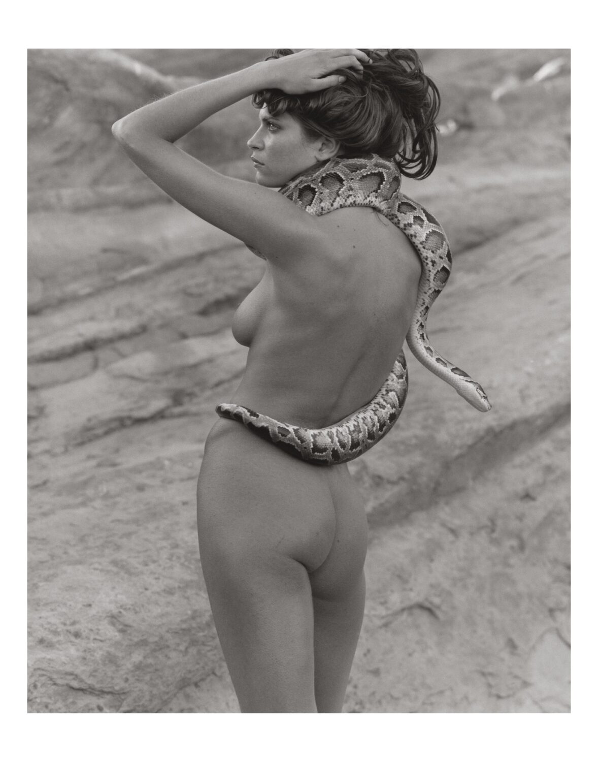 High Desert Art Fair Herb Ritts Frankie Rayder with Snake 1 Vasquez Rocks 2000 Silver Gelatin Photograph Courtesy of Fahey Klein Gallery