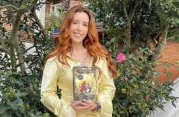 large Samantha Tauber press photo with book 1 1